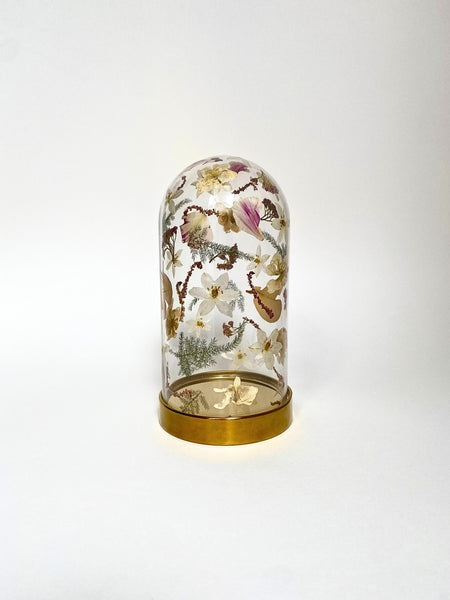Preservation of your wedding flowers into a glass dome