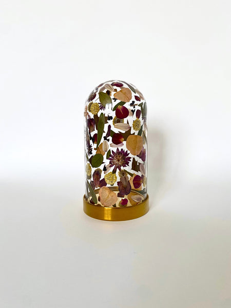 Preservation of your wedding flowers into a glass dome