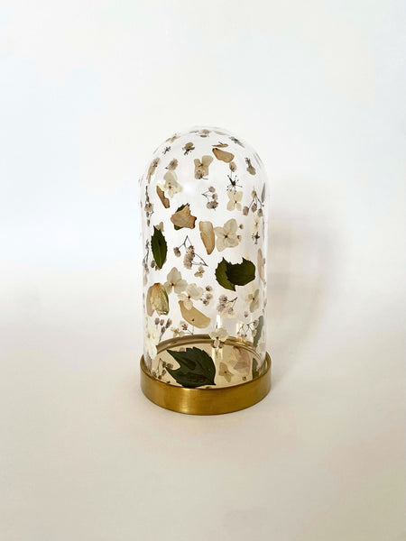 Preservation of your wedding flowers into a glass dome